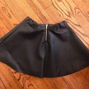 Black faux leather skirt.